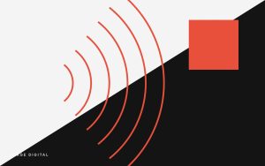 Red arcs against a dark diagonal field